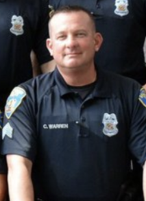 Christopher J. Warren